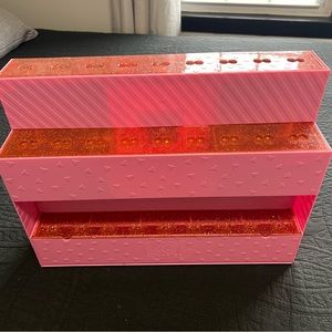 L O L doll stand and place it as one